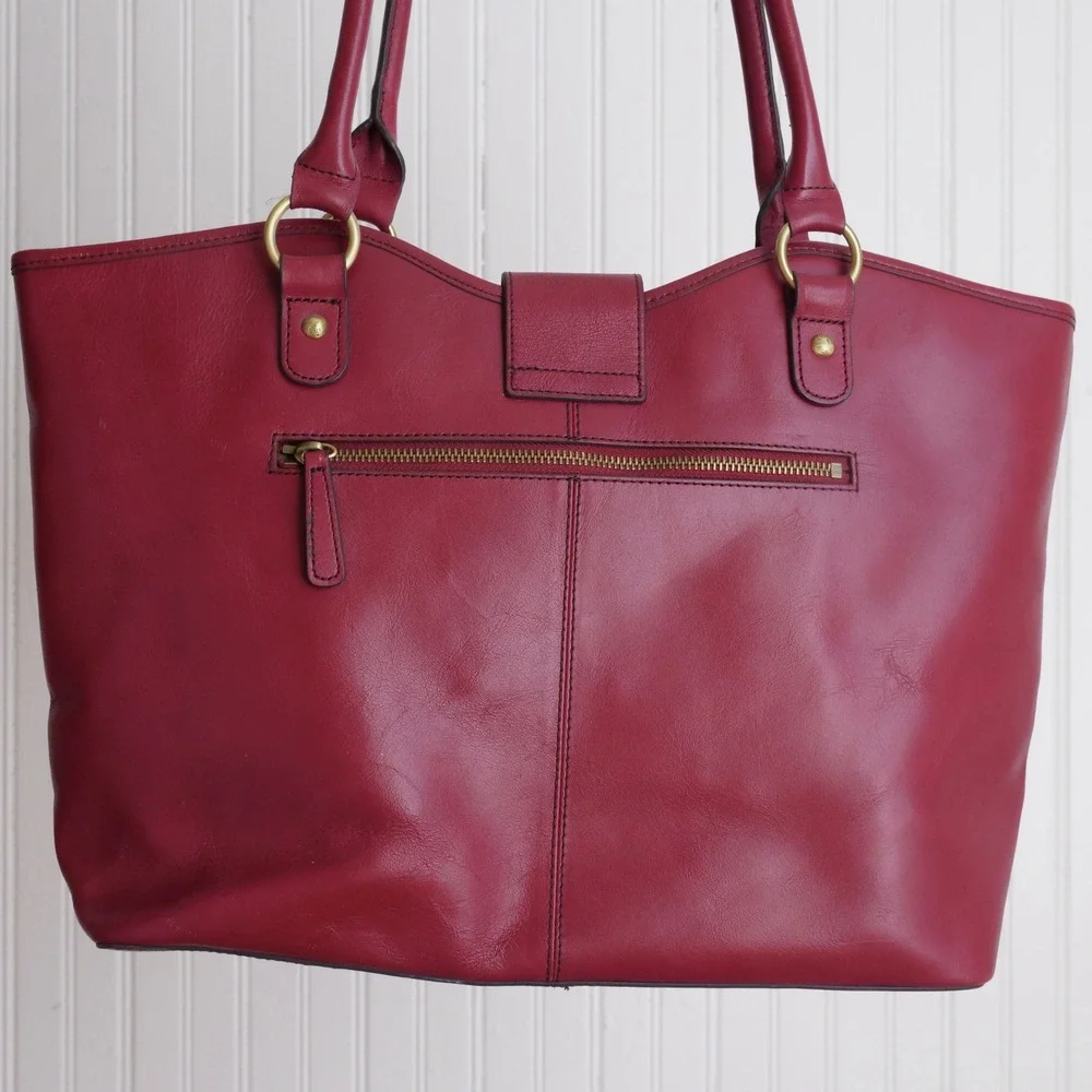 Chic Etienne Aigner burgundy leather shoulder tote with polished brass hardware